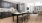 a kitchen with a table and chairs
