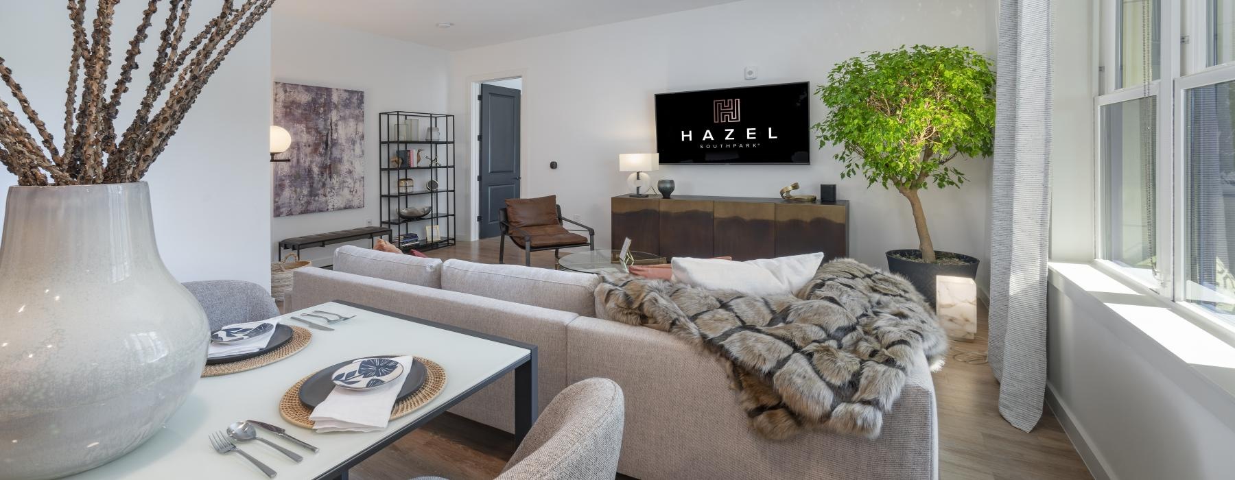 a living room with a couch and a table