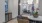 a spacious room with a couch and a table