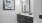 a bathroom with a painting on the wall